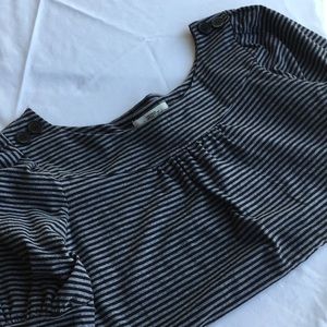 Black striped shirt with buttons on shoulder